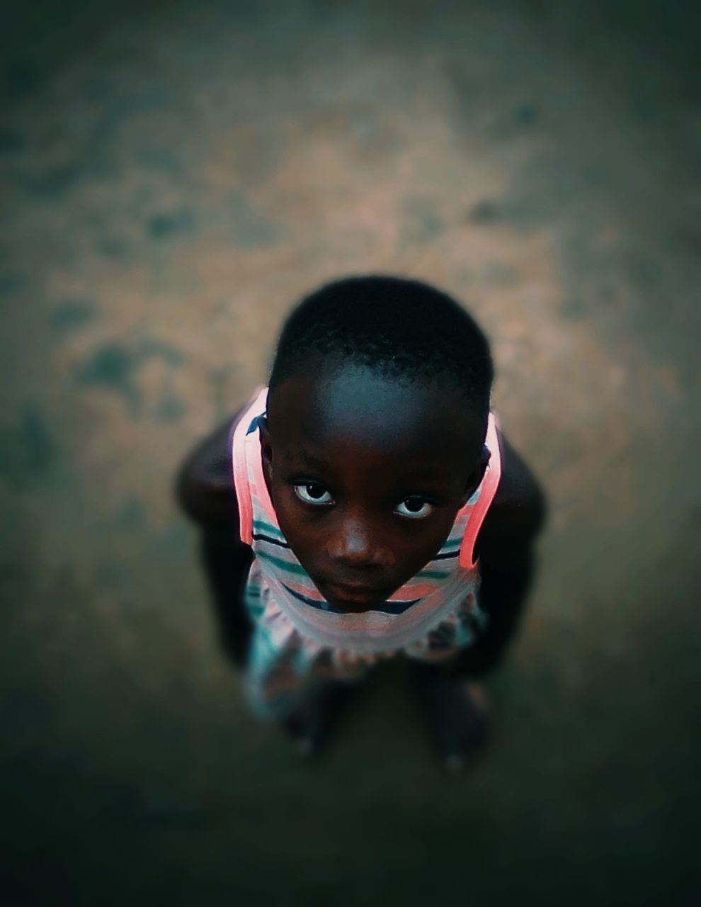 HIGH ANGLE PORTRAIT OF CUTE BOY