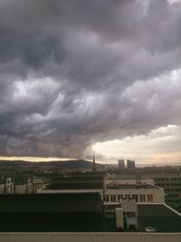 Storm clouds over city