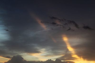 Low angle view of dramatic sky during sunset