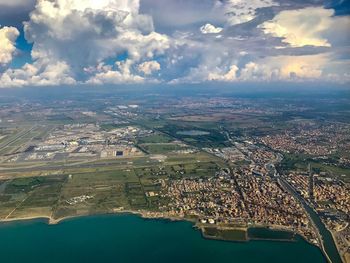 Aerial view of city against sky