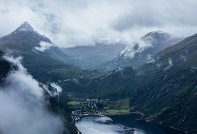 Scenic view of snowcapped mountains against sky, geiranger, norway