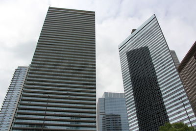 Low angle view of skyscrapers against sky