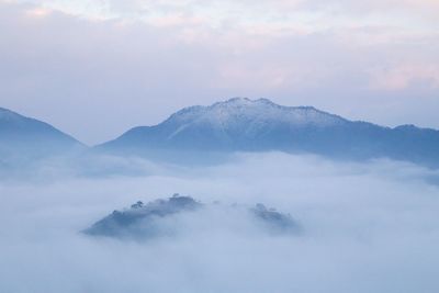 Close-up of mountain range against sky