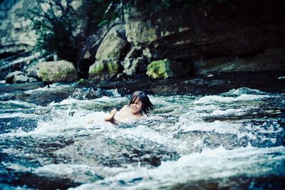 Boy playing in water