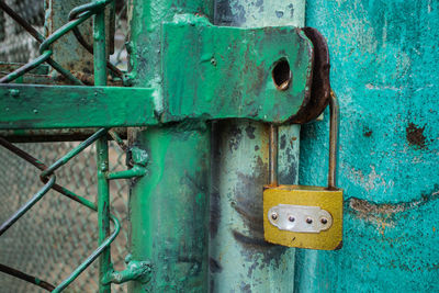 Close-up of padlock on door