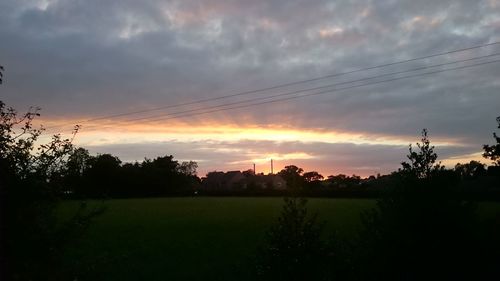 Scenic view of dramatic sky during sunset