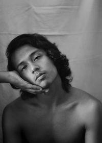 Portrait of shirtless man at home