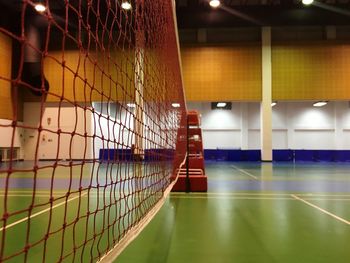 Net at illuminated badminton court