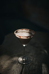 Close-up of wineglass on table