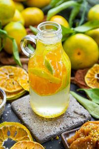 Close-up of drink in glass jar on table