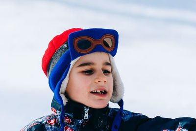 Close-up of boy wearing warm clothing during winter