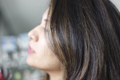 Close-up of woman with brown hair