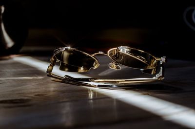 Close-up of sunglasses on table