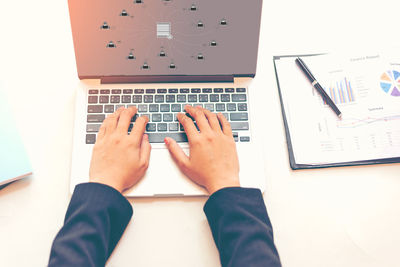 Low section of person working on table