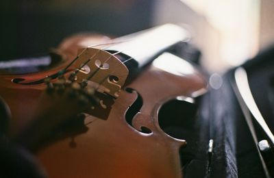 Close-up of man playing guitar