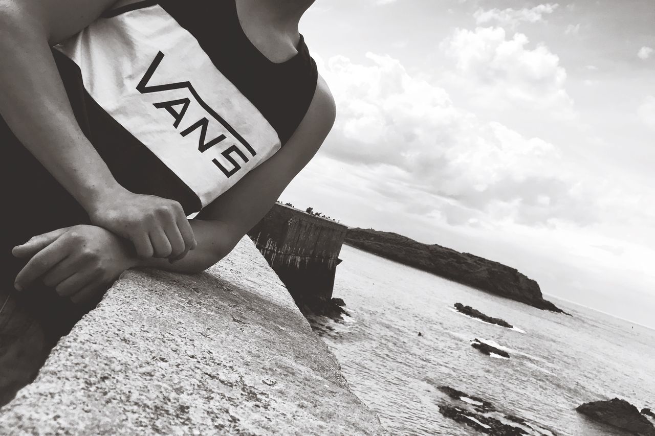 beach, text, day, sea, outdoors, sand, real people, sky, lifestyles, men, water, nature, one person, human hand, people