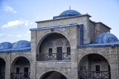 Low angle view of old building against sky