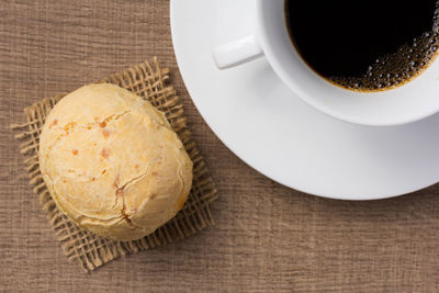 High angle view of coffee cup on table