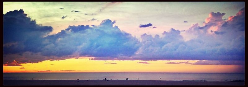 Scenic view of sea at sunset