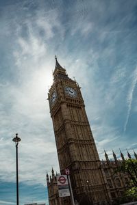 Low angle view of clock tower against sky