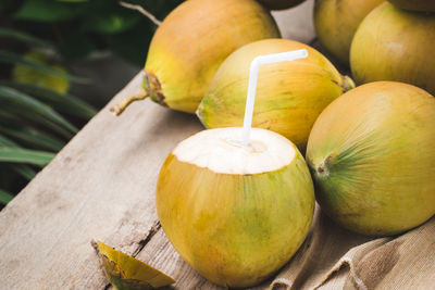 High angle view of fruits on wood