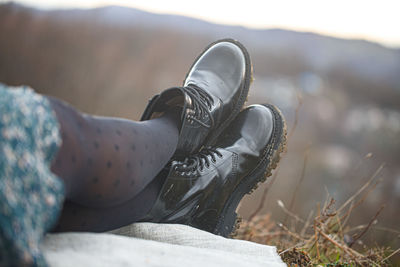 Low section of person wearing shoes
