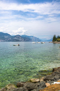 Scenic view of sea against sky at lake garda italy