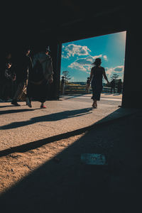 People walking on street in city