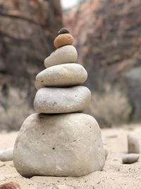 Close-up of stone stack on rock