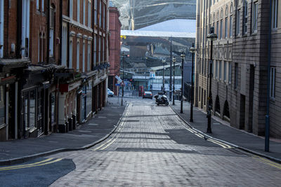 Street amidst buildings in city