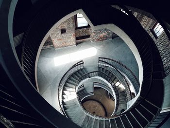 Directly below shot of spiral staircase in building