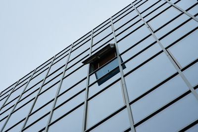 Low angle view of modern building against clear sky