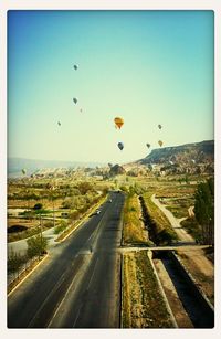 Empty road along landscape