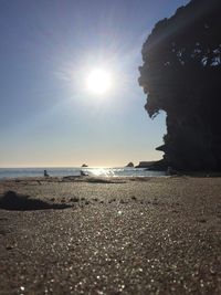 Scenic view of beach against sky during sunset