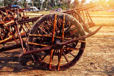 Abandoned wheel on field