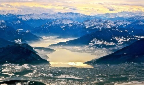 Scenic view of snowcapped mountains against sky