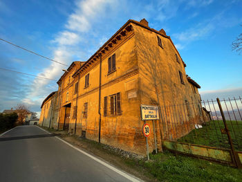 Low angle view of old building against sky
