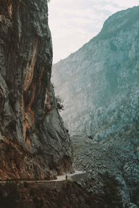 Scenic view of mountains against sky during foggy weather