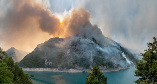Panoramic view of volcanic mountain against sky