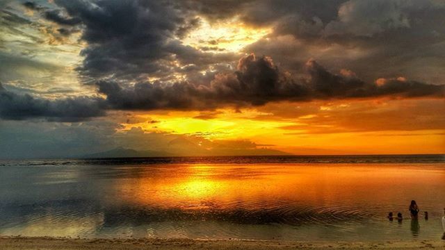 sunset, water, sea, sky, scenics, horizon over water, cloud - sky, beauty in nature, tranquil scene, beach, tranquility, reflection, orange color, idyllic, shore, cloudy, nature, cloud, dramatic sky, outdoors
