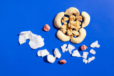 High angle view of cookies against blue background