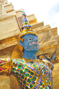 Low angle view of buddha statue