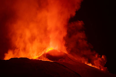 Scenic view of volcanic mountain during night