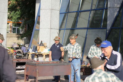 Group of people in front of building