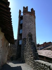 Low angle view of historic building against sky