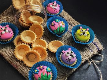 High angle view of cupcakes on table