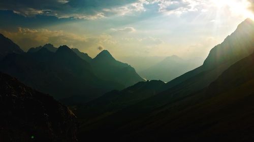 Scenic view of mountains against sky during sunset