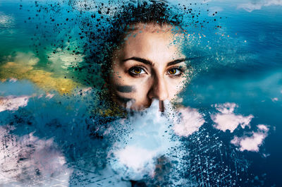 Portrait of young woman in swimming pool