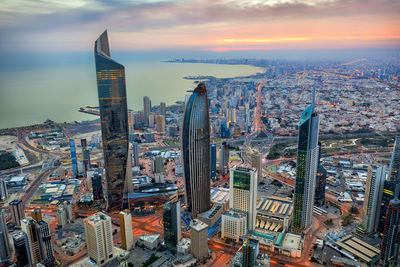 High angle view of city buildings during sunset