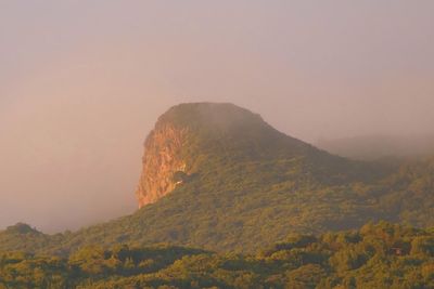 Scenic view of mountains against sky during sunset